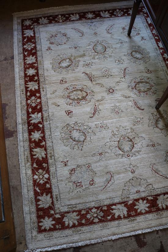Persian cream ground rug(-)